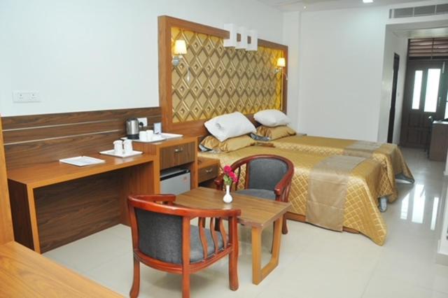 Kallada Mamatha Motels Kunnamkulam ภายนอก รูปภาพ